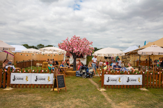 The Domaine des Jeanne wine bar and seating area at CarFest 2024